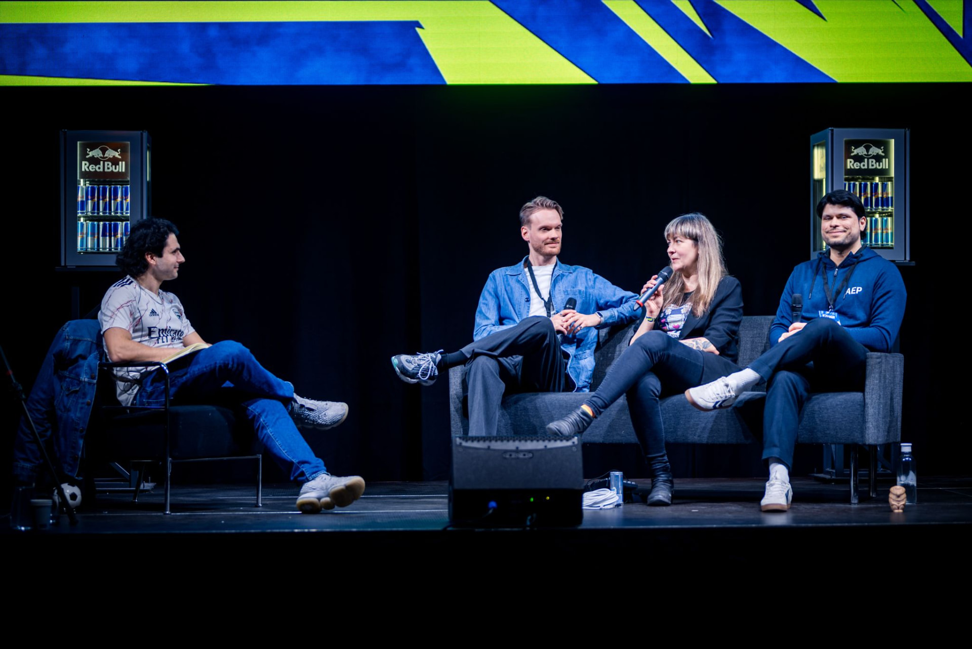 Trim Biba hosting a panel discussion on stage at Level Up Lund